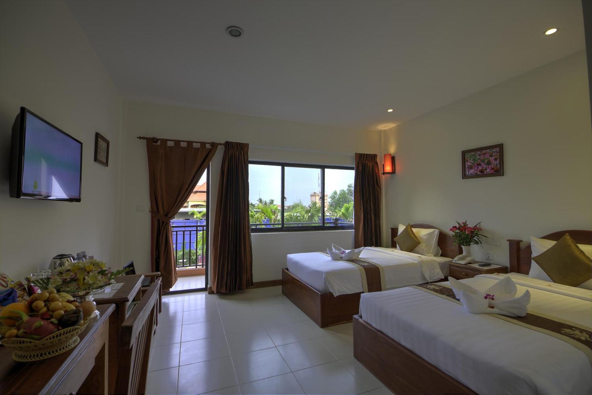 Kouprey Hotel Siem Reap Quarto foto